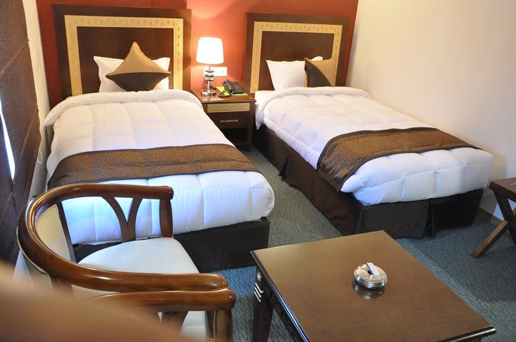 Silk Route Hotell Guwahati Rum bild