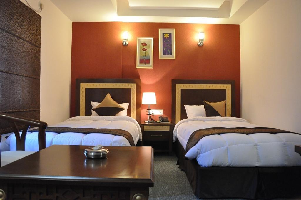 Silk Route Hotell Guwahati Rum bild