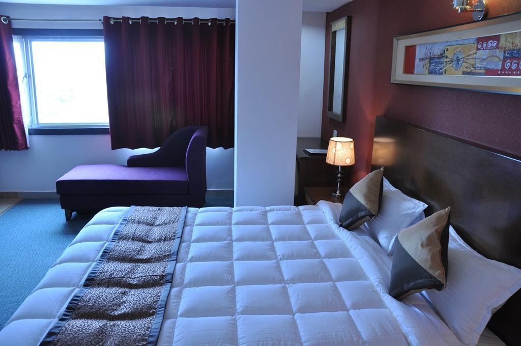 Silk Route Hotell Guwahati Rum bild